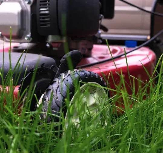 Professional lawn mowing service for homes in Brooklyn Center, MN by The Alley Crew