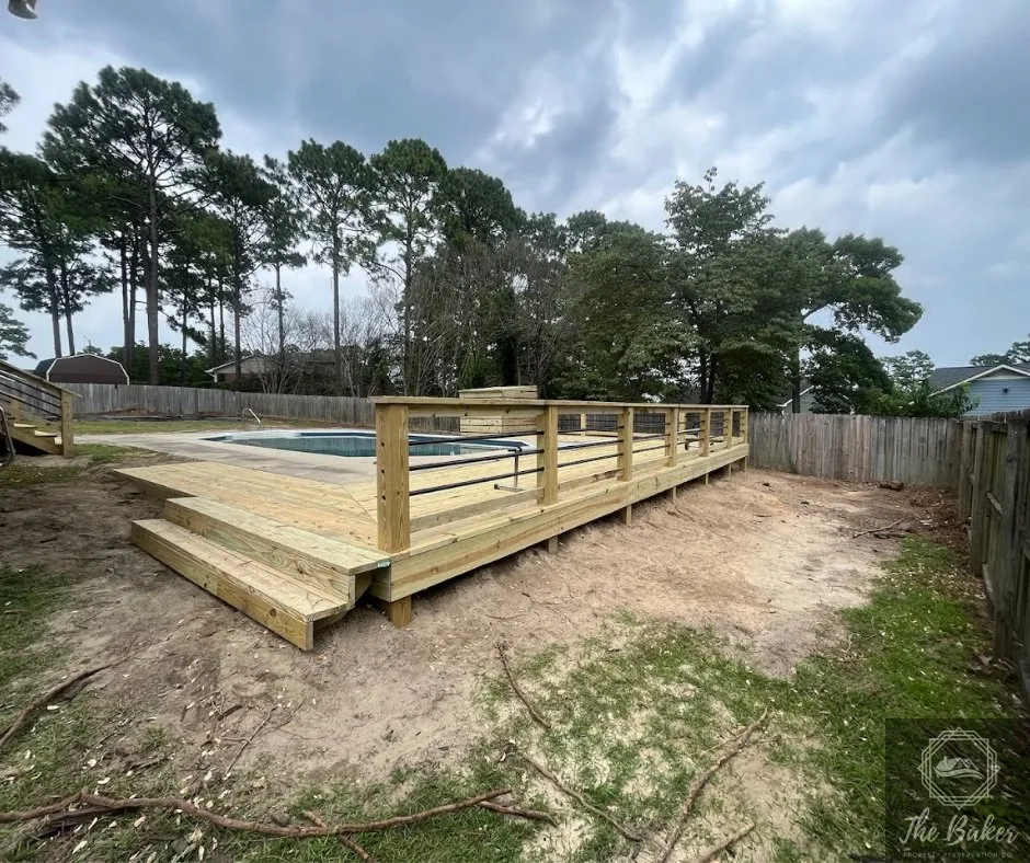 Custom yard cleanup service for year-round maintenance in Fayetteville, NC by The Baker Property Presevation