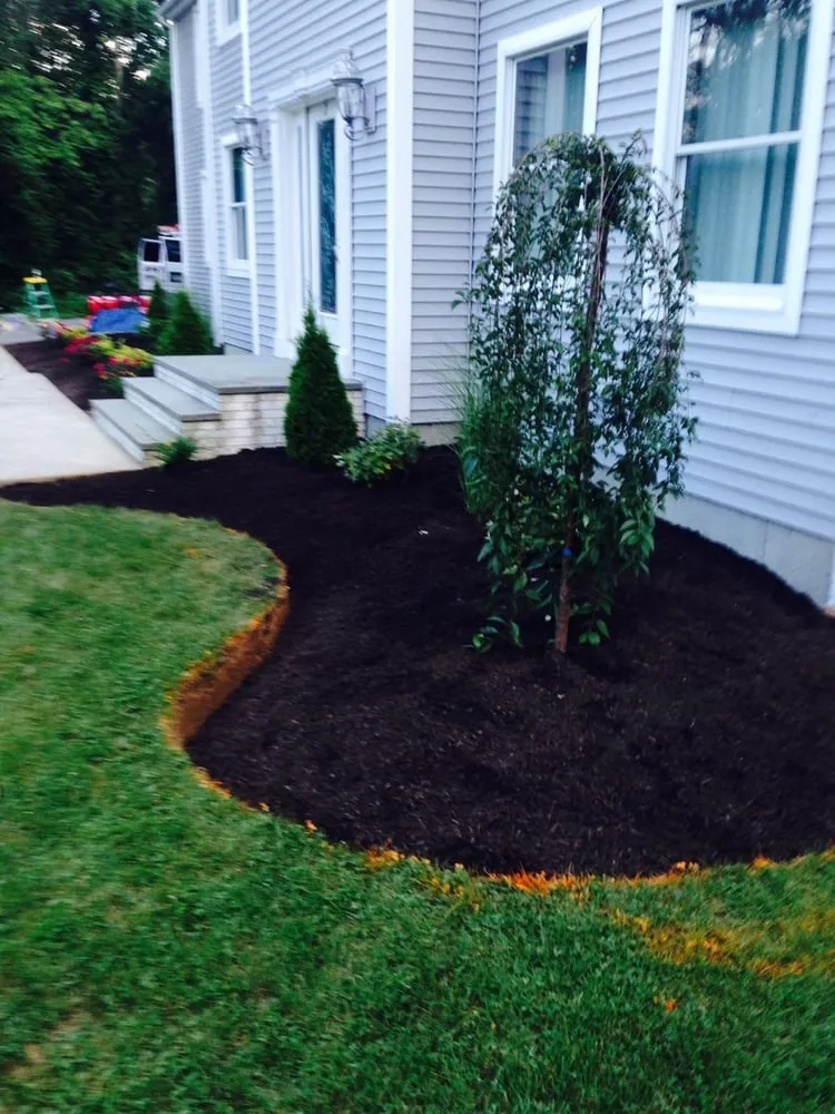 Custom landscape installation for year-round maintenance in Providence, RI by The Best Never Rest Landscaping
