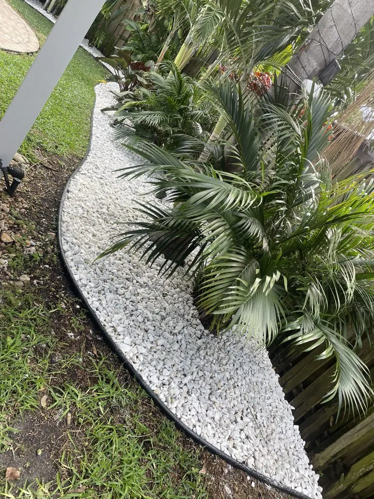 Custom landscape installation in Lake Worth, FL by The Blessing Landscaping
