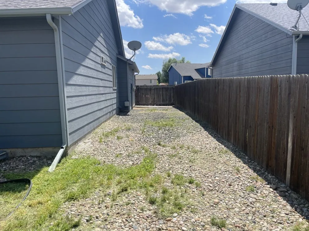 Trusted yard cleanup service in Colorado Springs, CO - The BOOM Bros Lawn & Garden