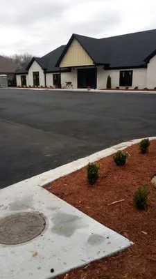 The Brothers Land & Lawn Logo