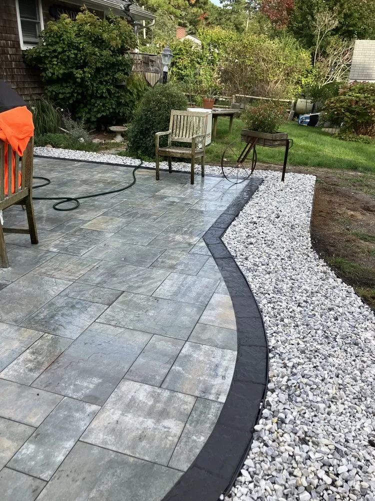 Professional yard maintenance for residential properties across Mashpee, MA - The Cape Landscape & Construction