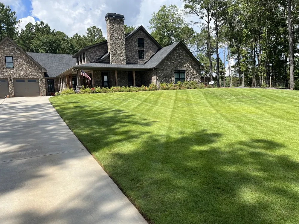 Custom landscape installation in Loganville, GA - The Clay Team Lawn Care