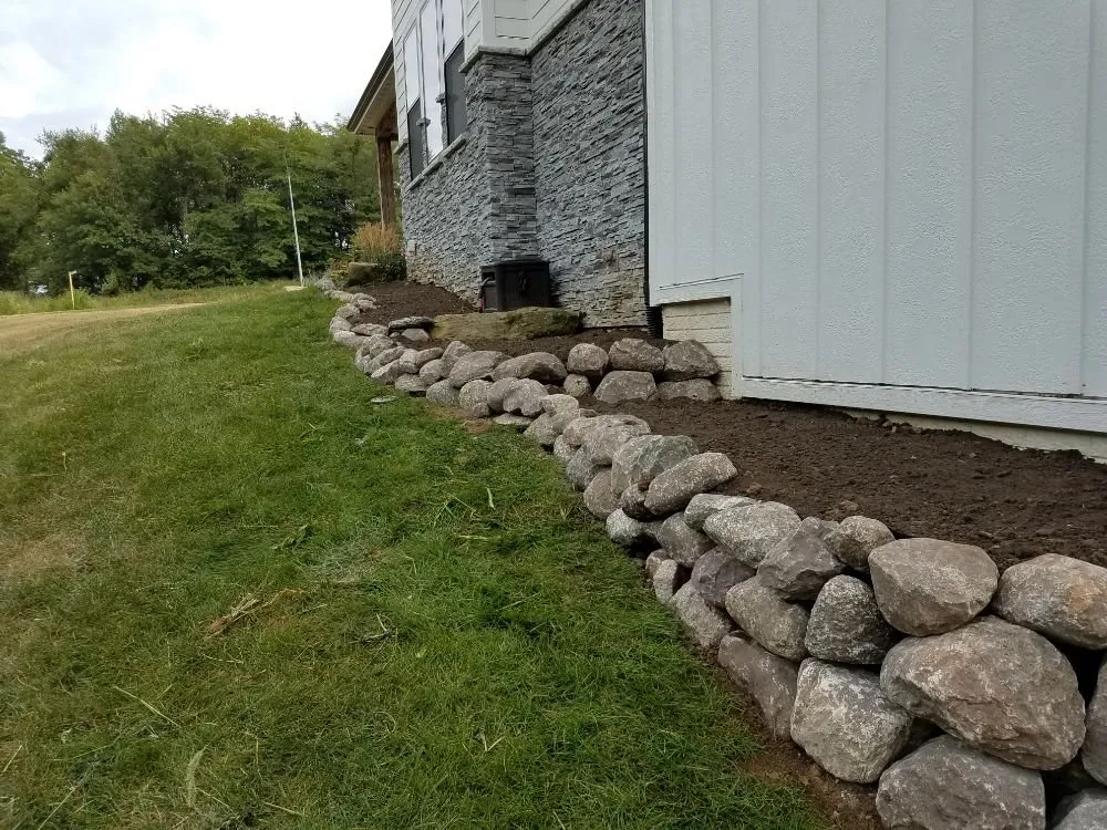 Expert lawn mowing service with custom design across WDM, IA - The C&R Trees And More