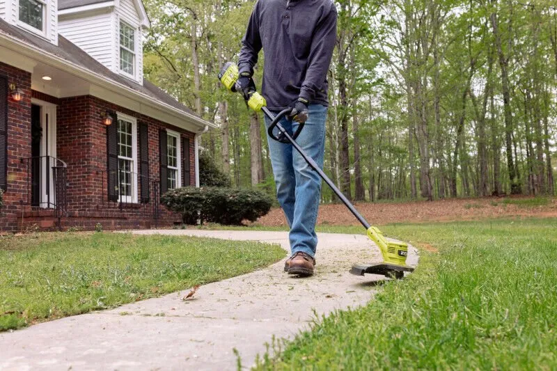 Affordable lawn mowing service with custom design across Jeffersonville, IN - The Cutting Hedge