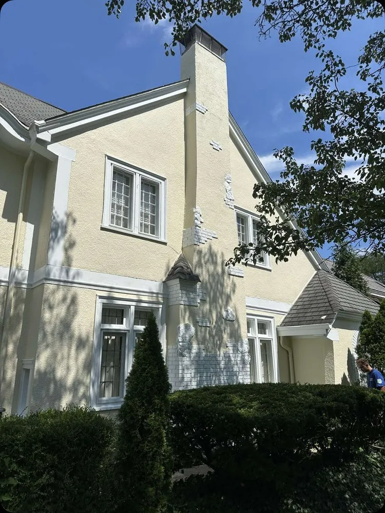 Custom lawn mowing service for homes in Newport, KY by The Dean's List