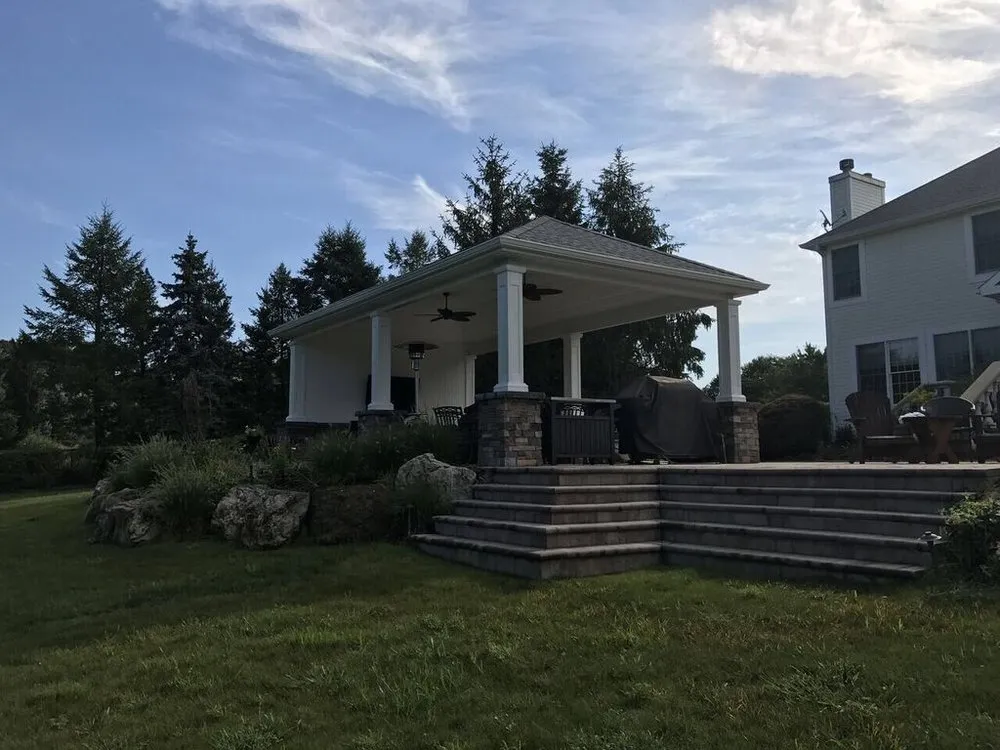 Custom landscape installation for homes in Greenlawn, NY by The Deck And Patio