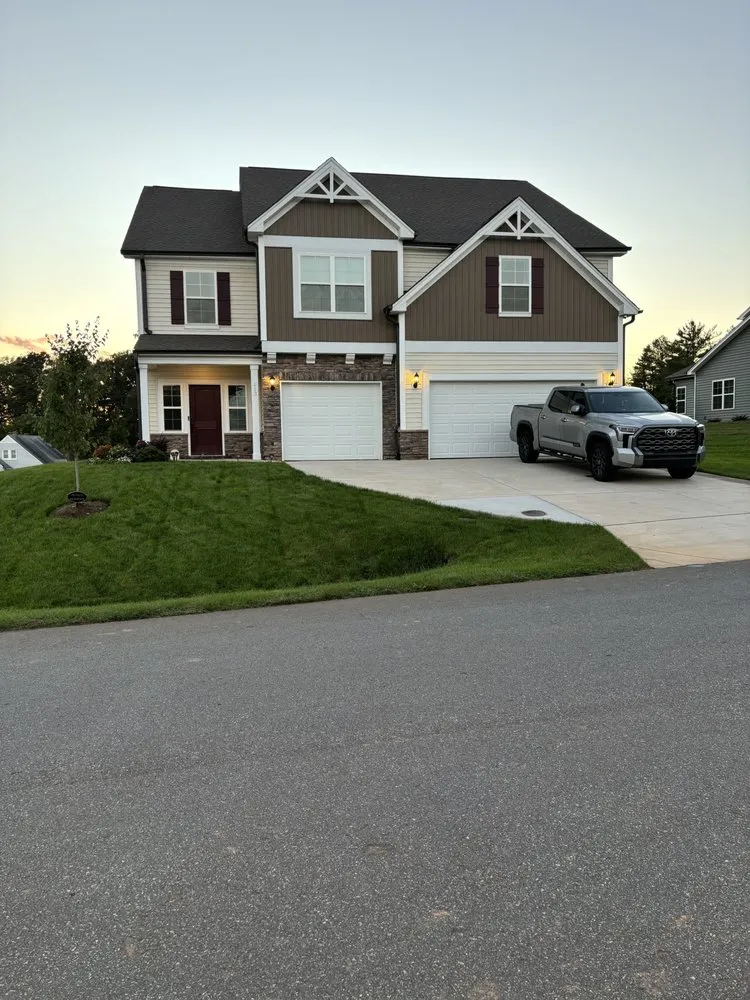 Expert lawn mowing service for homes in Lewisville, NC by The Dub Lawn Care Services