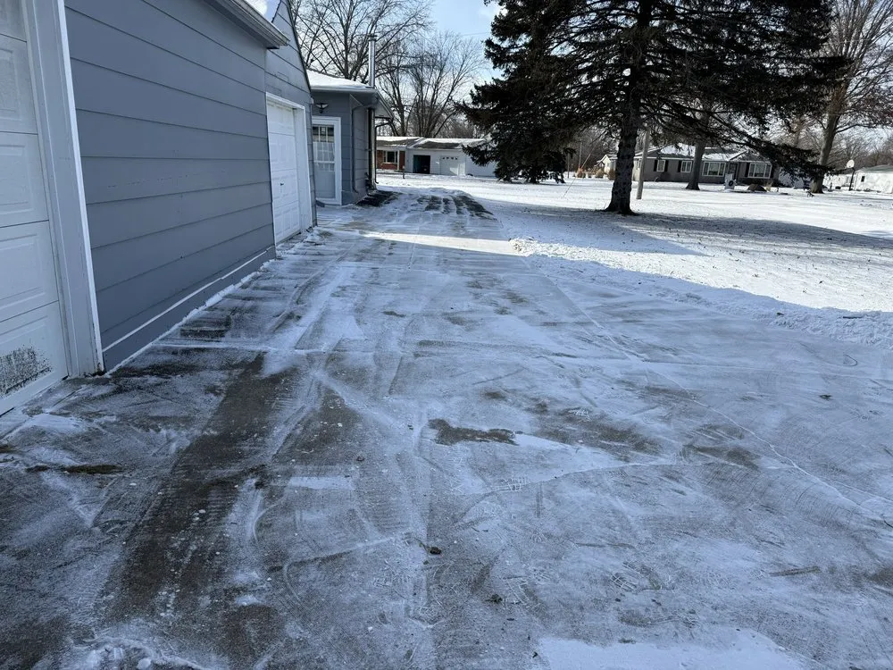 Custom landscape installation with custom design across Waterloo, IA - The Edgar Effect