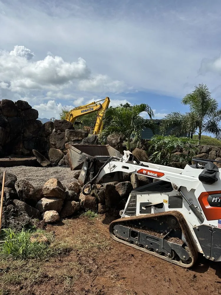 Expert lawn mowing service for residential properties in Urban Honolulu, HI by The Friendly Bobcat