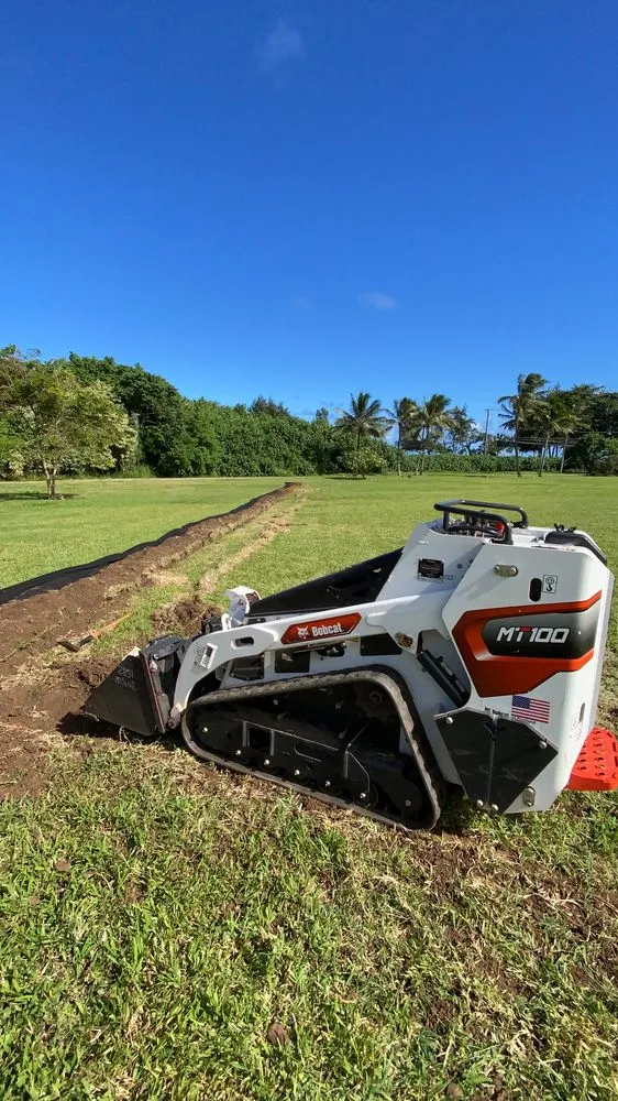 Professional garden landscaping with custom design across Urban Honolulu, HI - The Friendly Bobcat