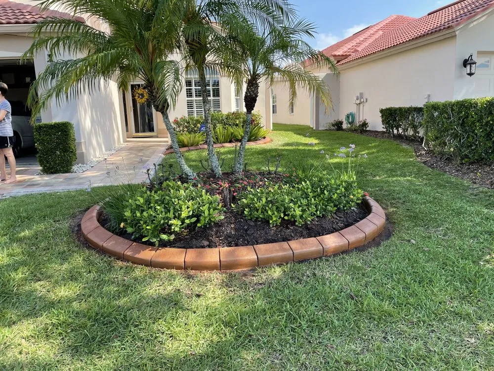 Custom landscape design with custom design in Dade City, FL by The Gardens Edge