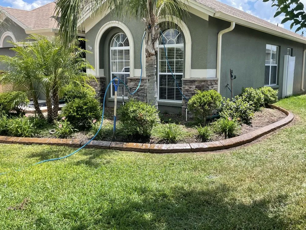 Local lawn mowing service in Dade City, FL by The Gardens Edge