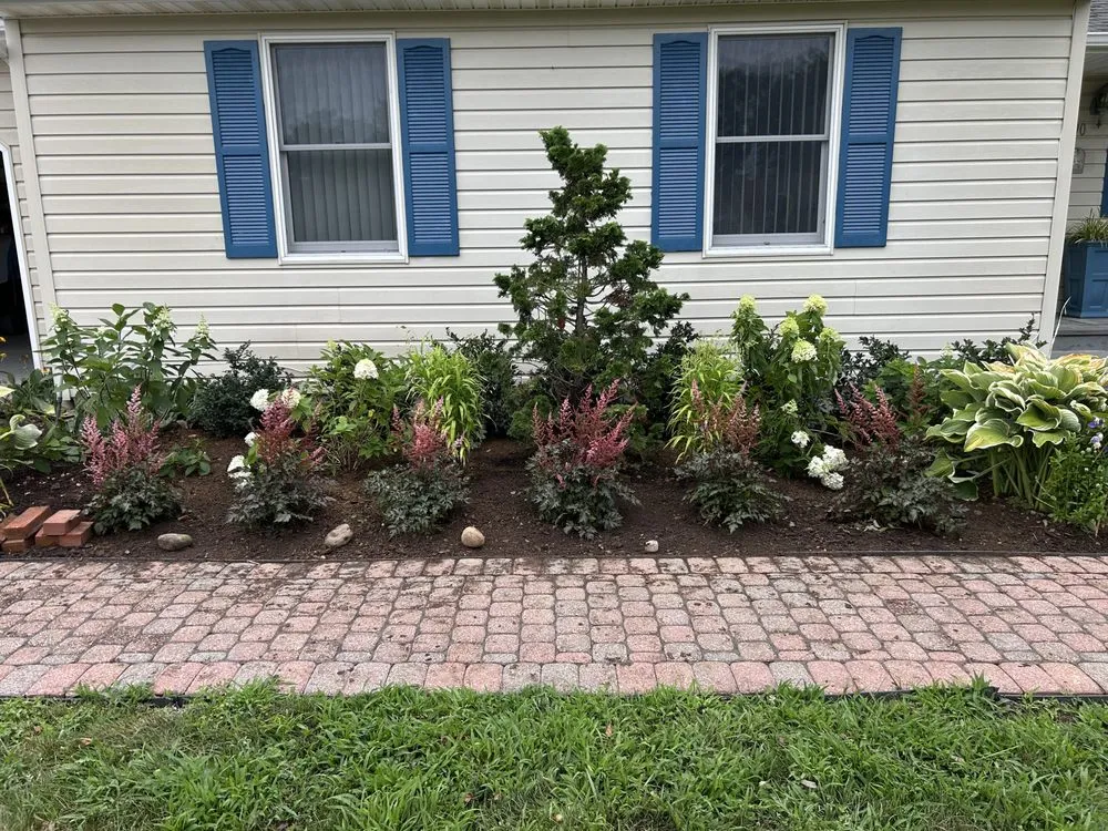 Reliable landscape installation for homes in Jamesport, NY by The Golden Tulip