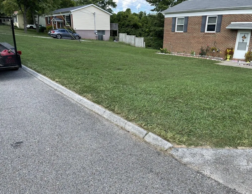 Professional landscape design for residential properties in Knoxville, TN by The Grass Barber Lawn Service