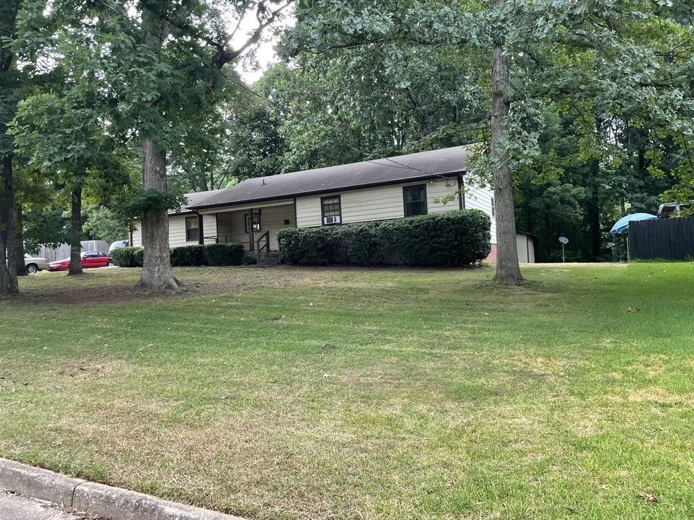 Trusted yard cleanup service for residential properties in Carrollton, GA by The Grass Father Lawn Maintenance