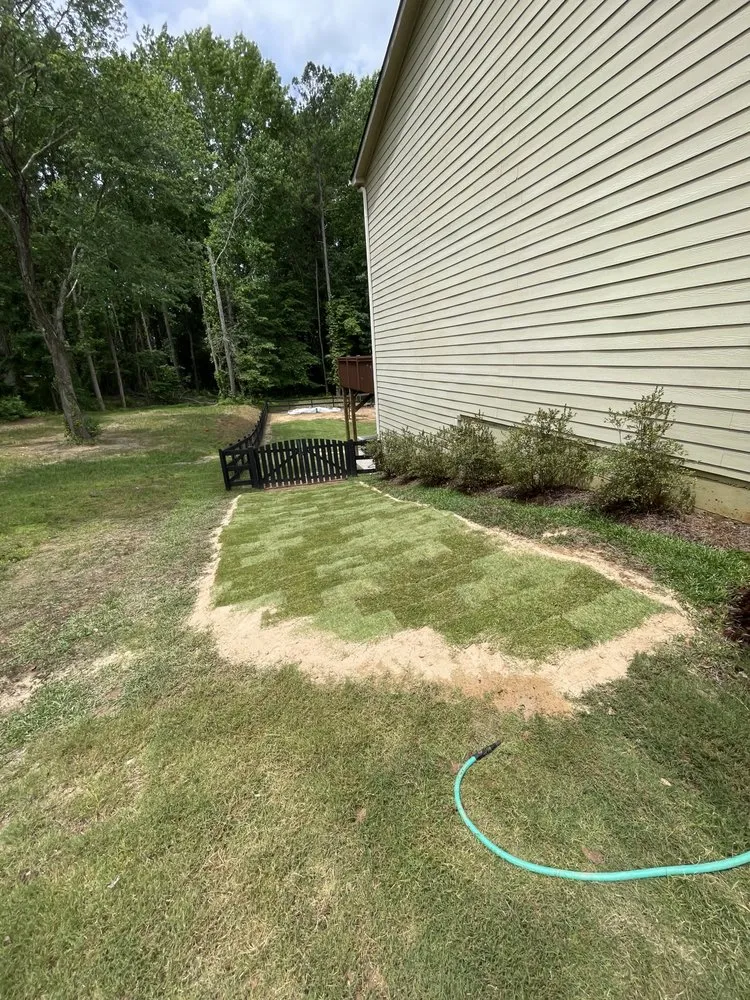 Top-rated garden landscaping with custom design in Carrollton, GA by The Grass Father Lawn Maintenance