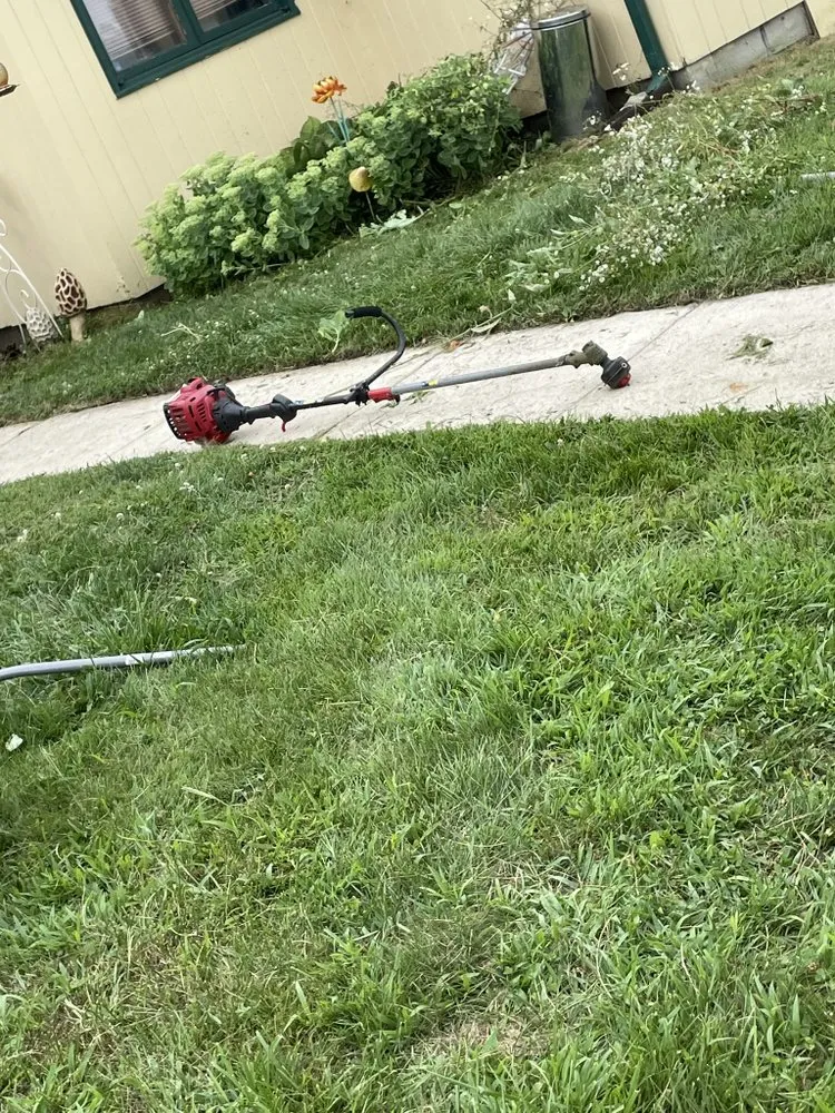 Expert yard maintenance in Michigan City, IN by The Grass Krew