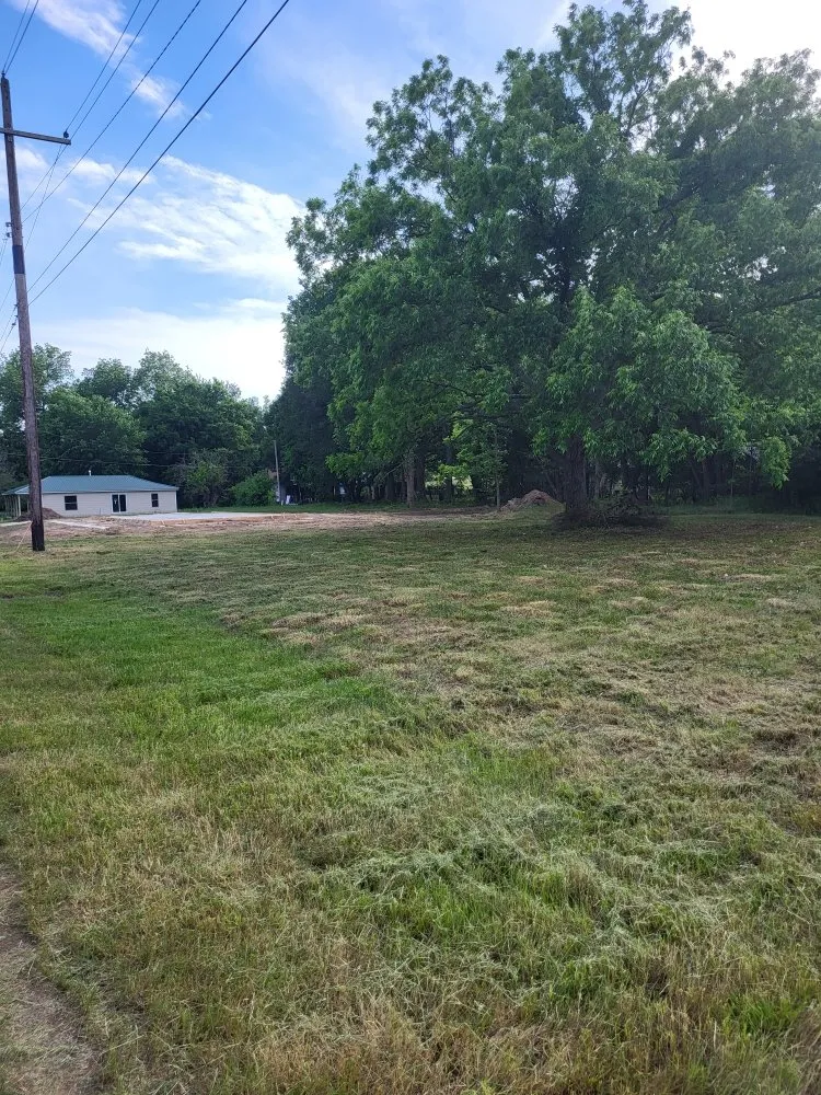 Local garden landscaping with custom design in McAlester, OK by The Grass Ninja