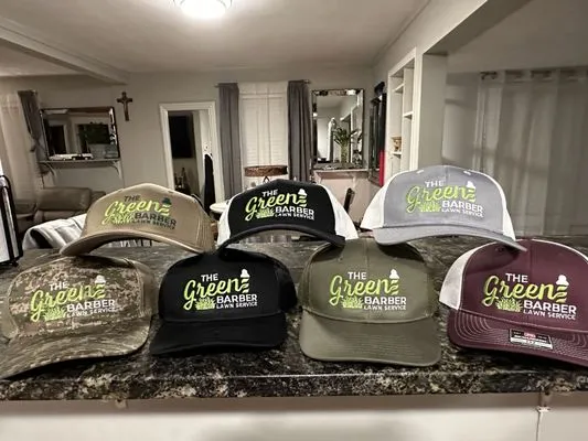 The Green Barber Lawn Service Logo