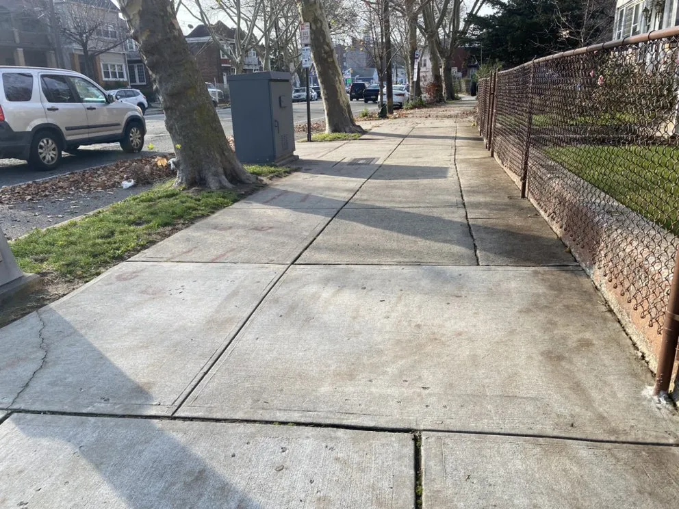 Top-rated yard cleanup service for residential properties in Jersey City, NJ by The Green Landscaping Service