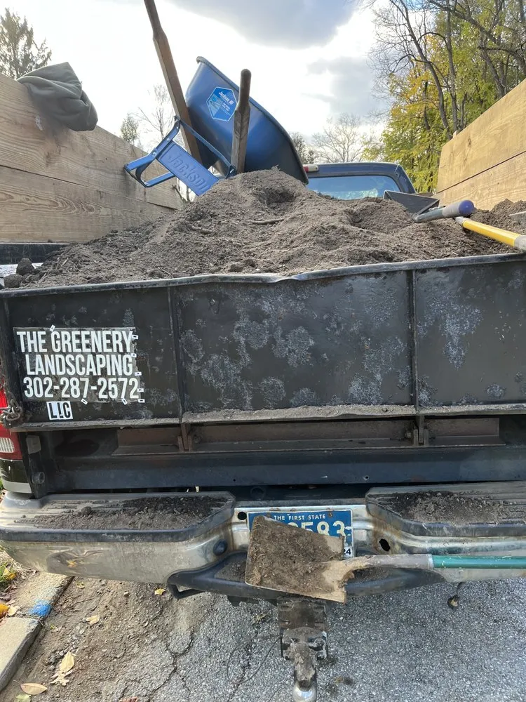 Professional landscape installation for year-round maintenance in Wilmington Manor, DE by The Greenery Landscaping