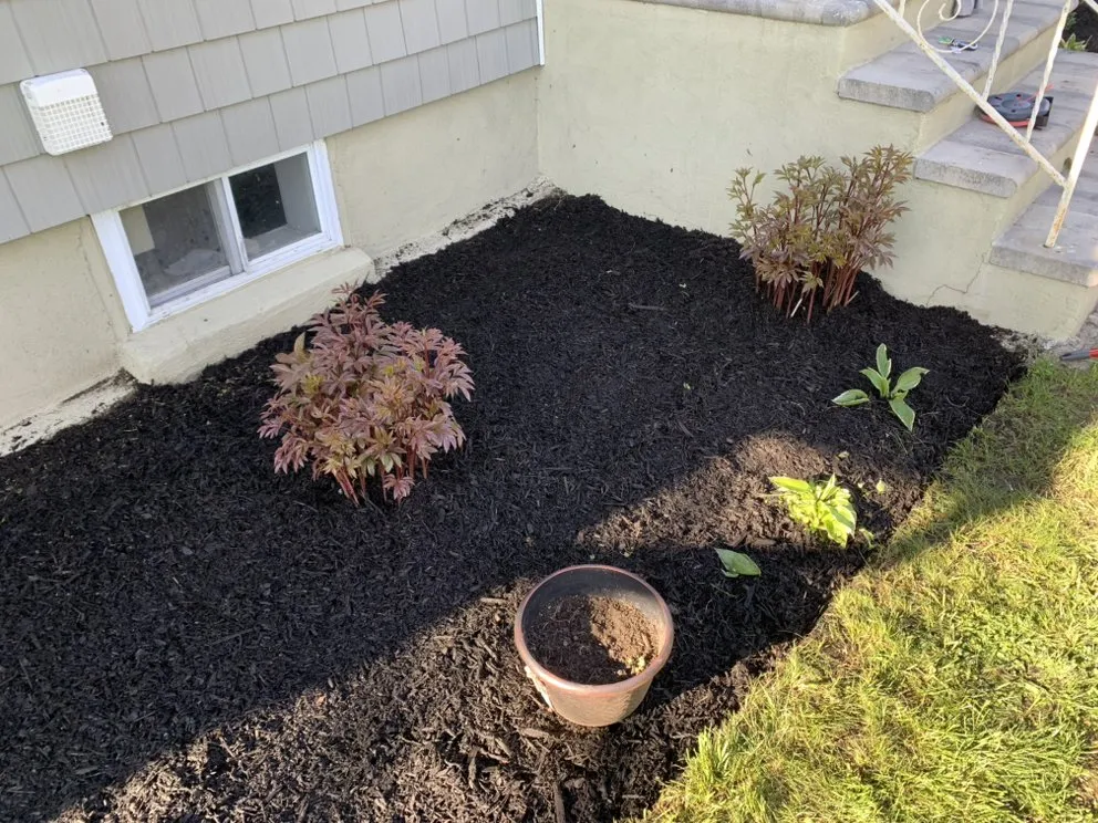 Affordable residential landscaping in Wyandanch, NY by The Gridiron