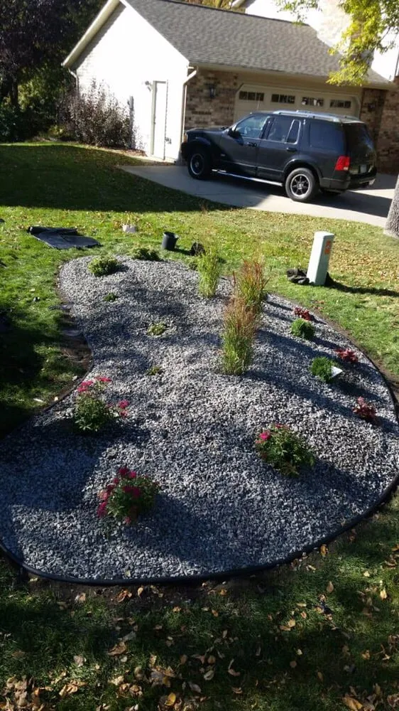 Local lawn care service for residential properties in Burnsville, MN by The Grounds Crew
