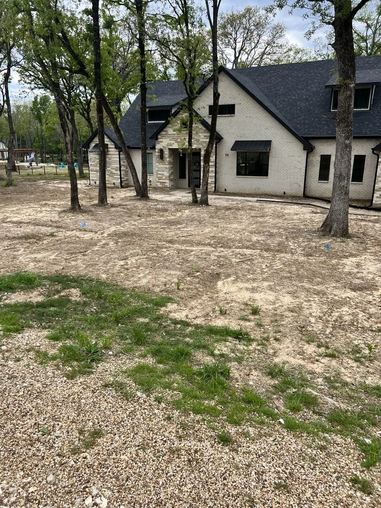 Custom landscape installation for outdoor upgrades in Kemp, TX by The Grounds Guys of Cedar Creek Lake