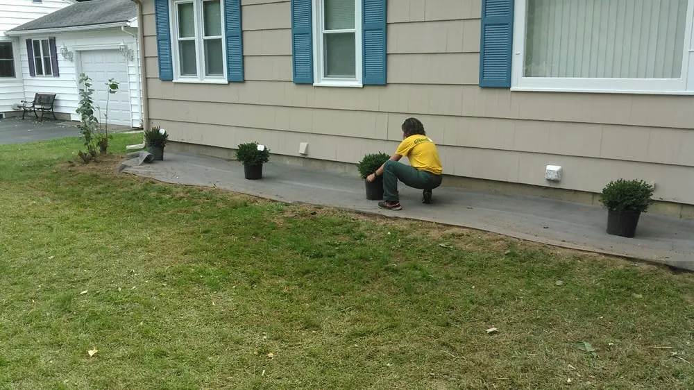 Affordable yard maintenance for residential properties in Rochester, NY by The Grounds Guys Of Greece