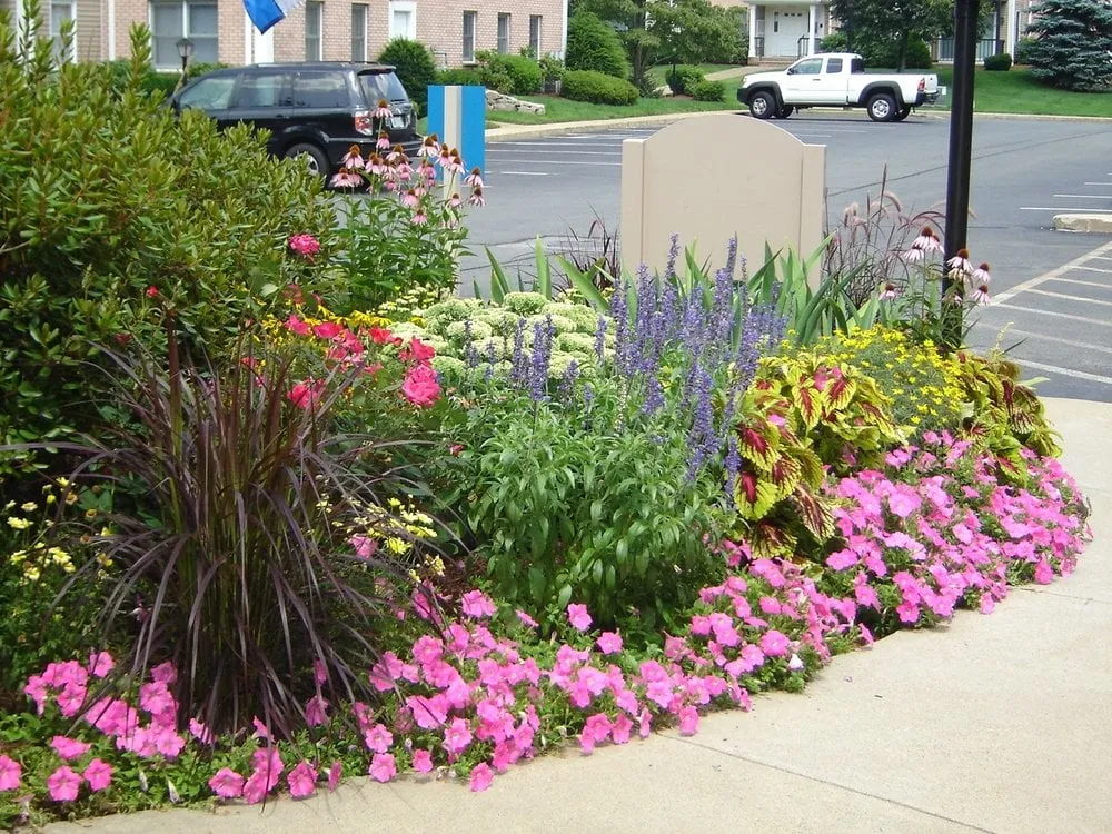 Professional yard maintenance with custom design across Ashland, MA - The GroundsKeeper, Inc.