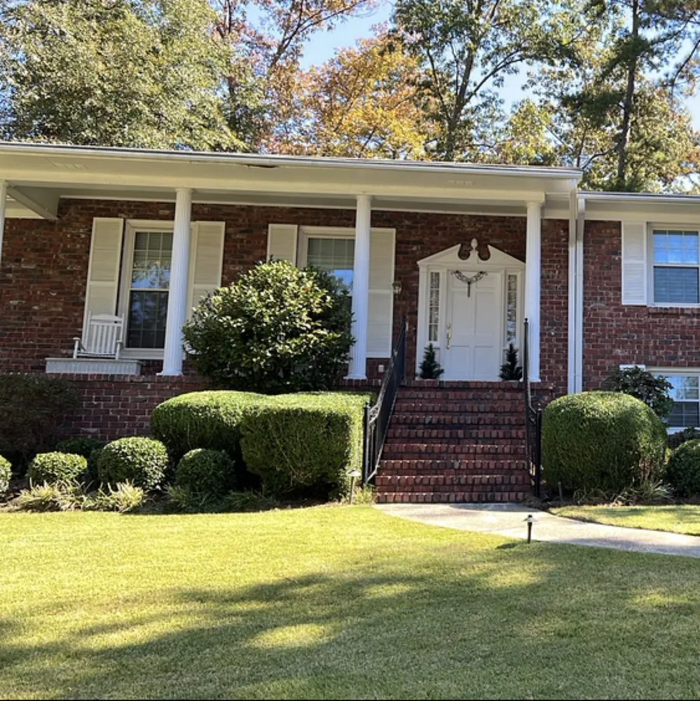 Custom lawn care service for residential properties in Birmingham, AL by The groundskeepers