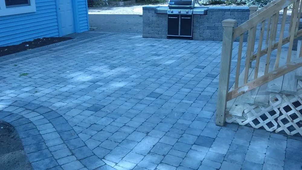 Custom landscape installation for year-round maintenance across Warren, MI - The Guy Outdoor Services