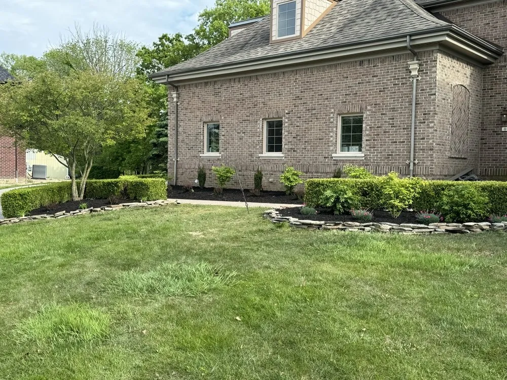 Local lawn mowing service for homes in Trenton, MI by The Guys Landscaping