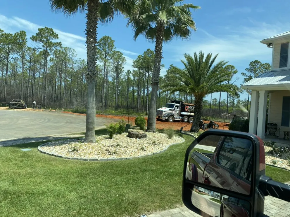 Custom lawn care service for year-round maintenance across Grand Bay, AL - The Hatcher Group