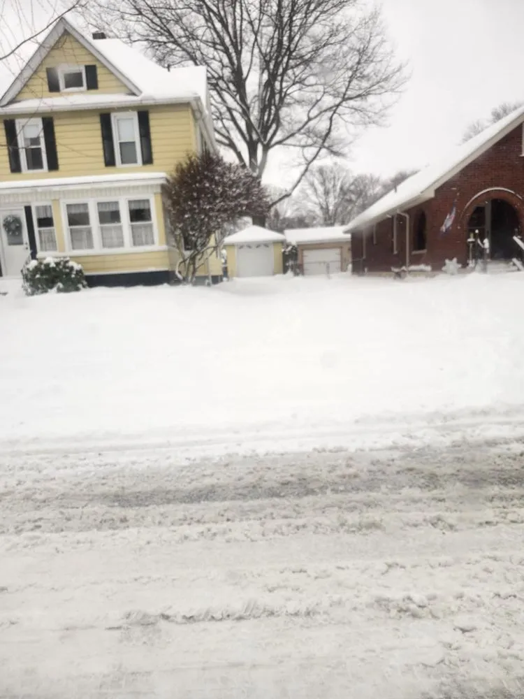 Professional lawn mowing service for outdoor upgrades across Erie, PA - The Helpful Hand Cleaning and Moving services