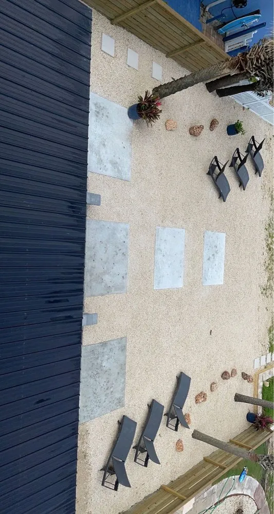 Affordable lawn care service with custom design across Palm Coast, FL - The Honey Dewer