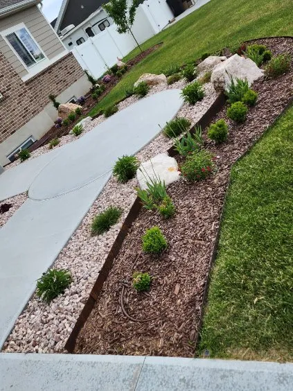 Expert garden landscaping for beautiful yards across Clinton, UT - The landscape barbers