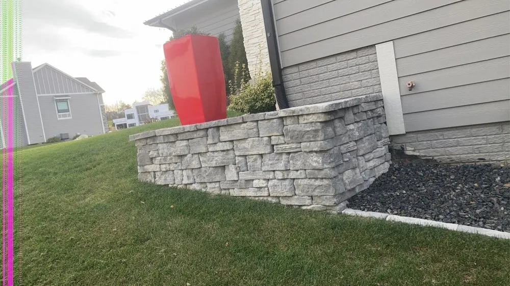 Local yard cleanup service in Des Moines, IA by The Landscape Company