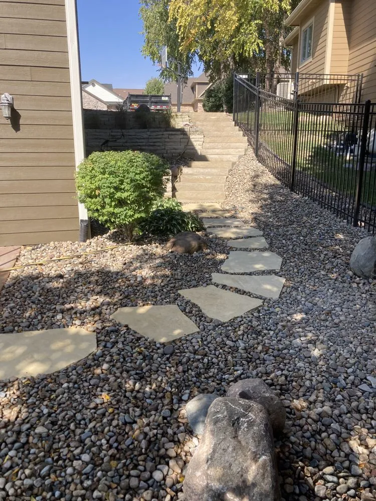 Professional landscape installation for residential properties in Des Moines, IA by The Landscape Company