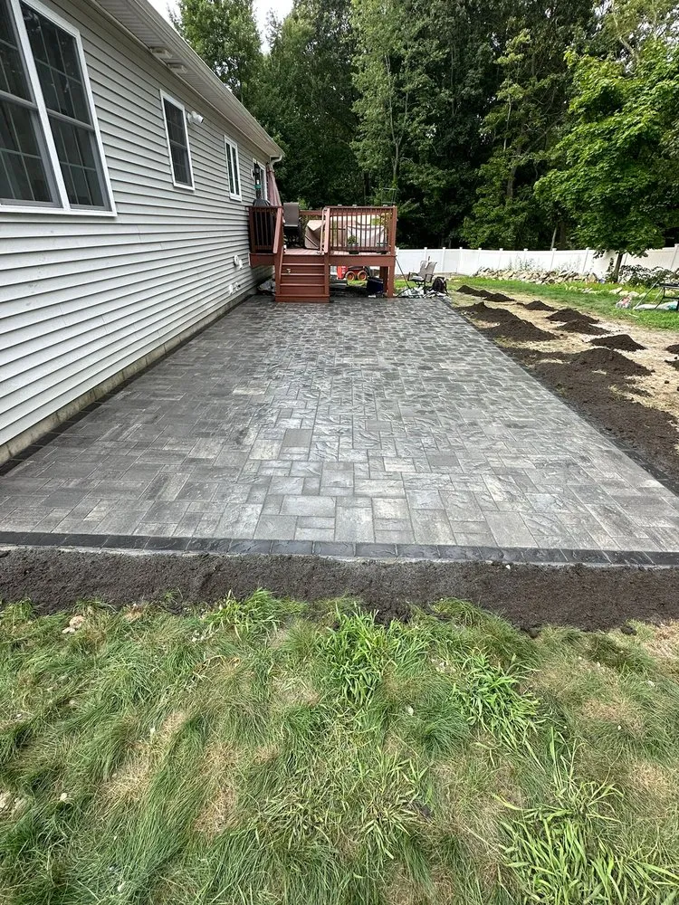 Top-rated outdoor landscaping for homes in Warwick, RI by The Landscape of New England