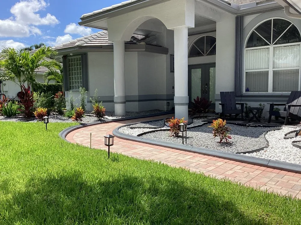Professional yard maintenance experts serving Coral Springs, FL - The Landscape Whisperer