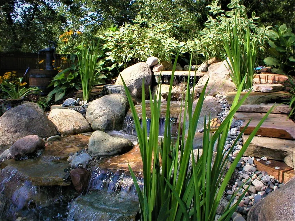 Expert lawn care service for residential properties across Greenville, MI - The Landsculptor