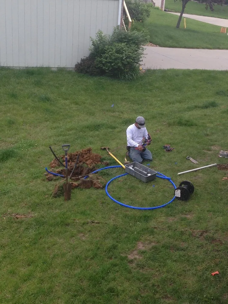 Custom outdoor landscaping in Parkville, MO by The Lawn & Sprinkler Guys