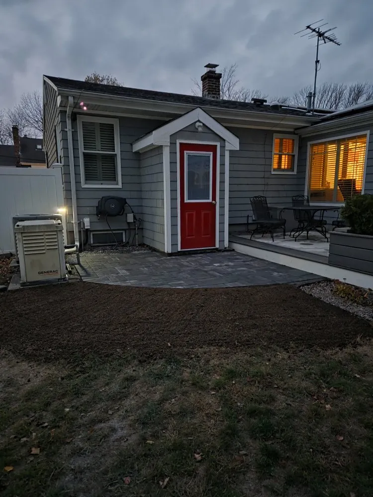 Expert outdoor landscaping for residential properties in Dighton, MA by The Lawn Artist