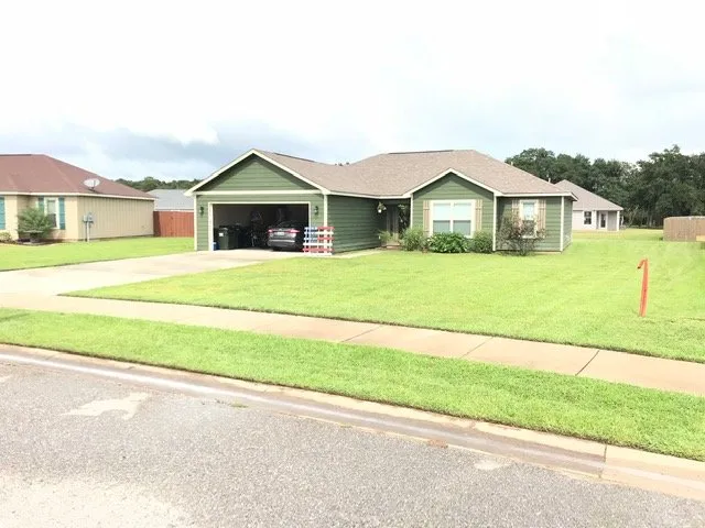 Trusted lawn care service for year-round maintenance in Foley, AL by The Lawn Barber