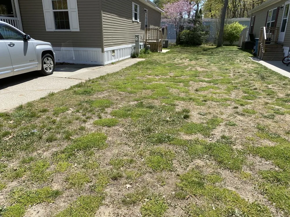 Reliable outdoor landscaping for residential properties in Muskegon, MI by The Lawn Barber