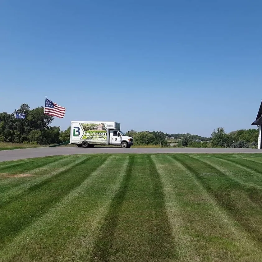 Expert lawn mowing service for residential properties in Elysian, MN by The Lawn Barber Services