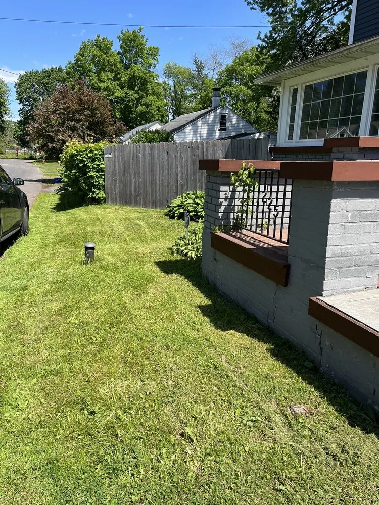 Custom yard maintenance with custom design across Syracuse, NY - The lawn barber